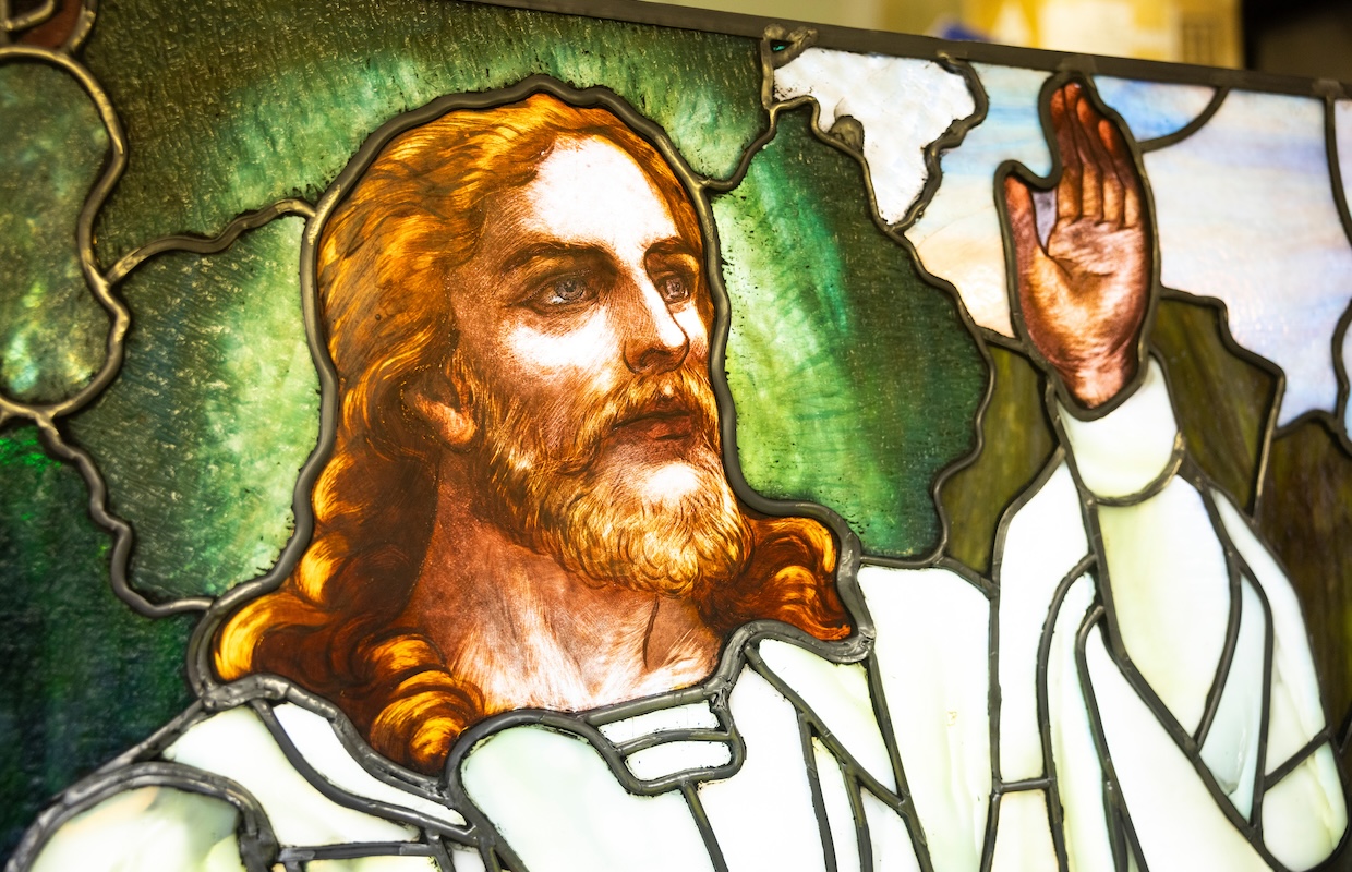 Stained glass image of Christ.