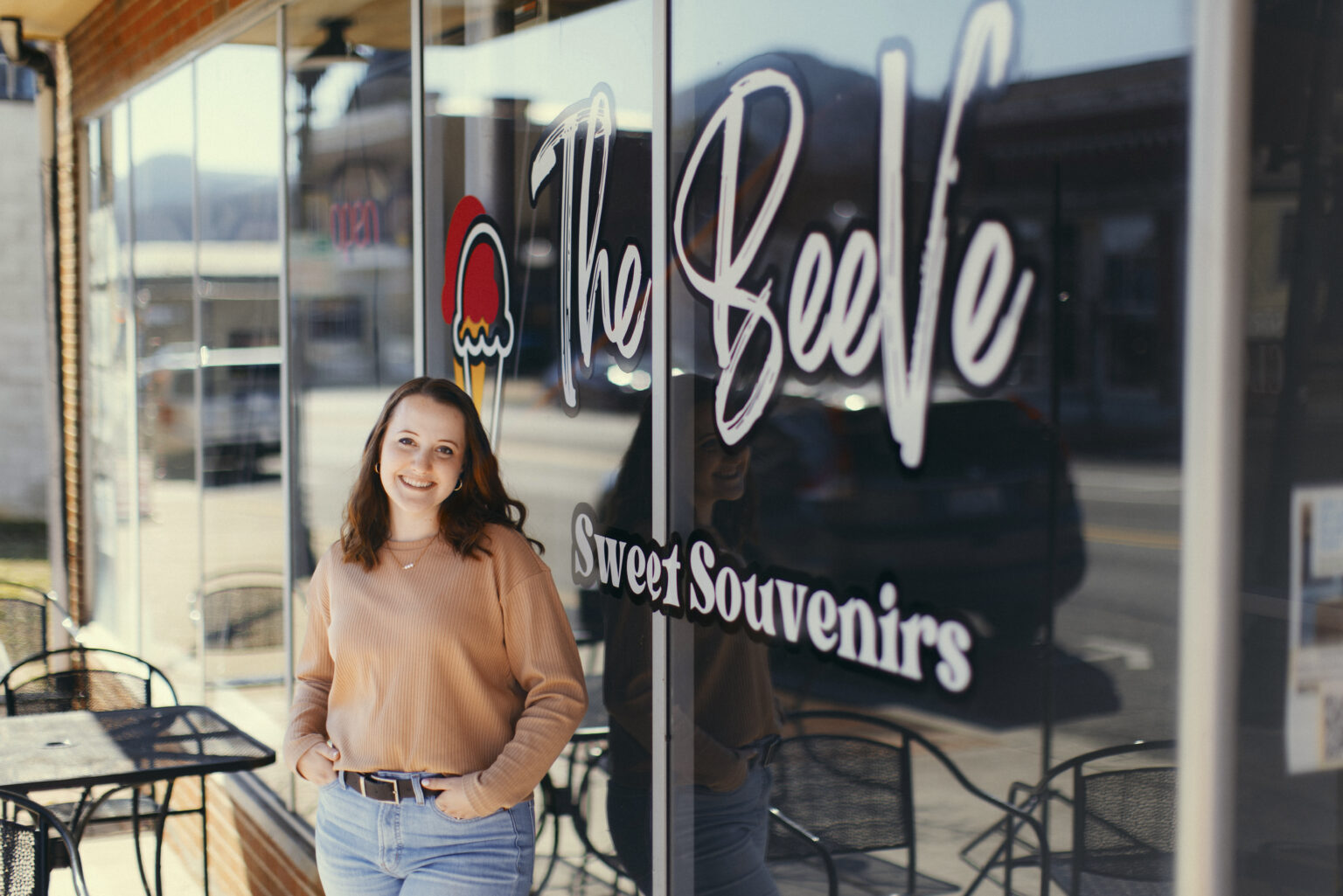 Alumna Madeleine Mercer in front of her store The BeeVe