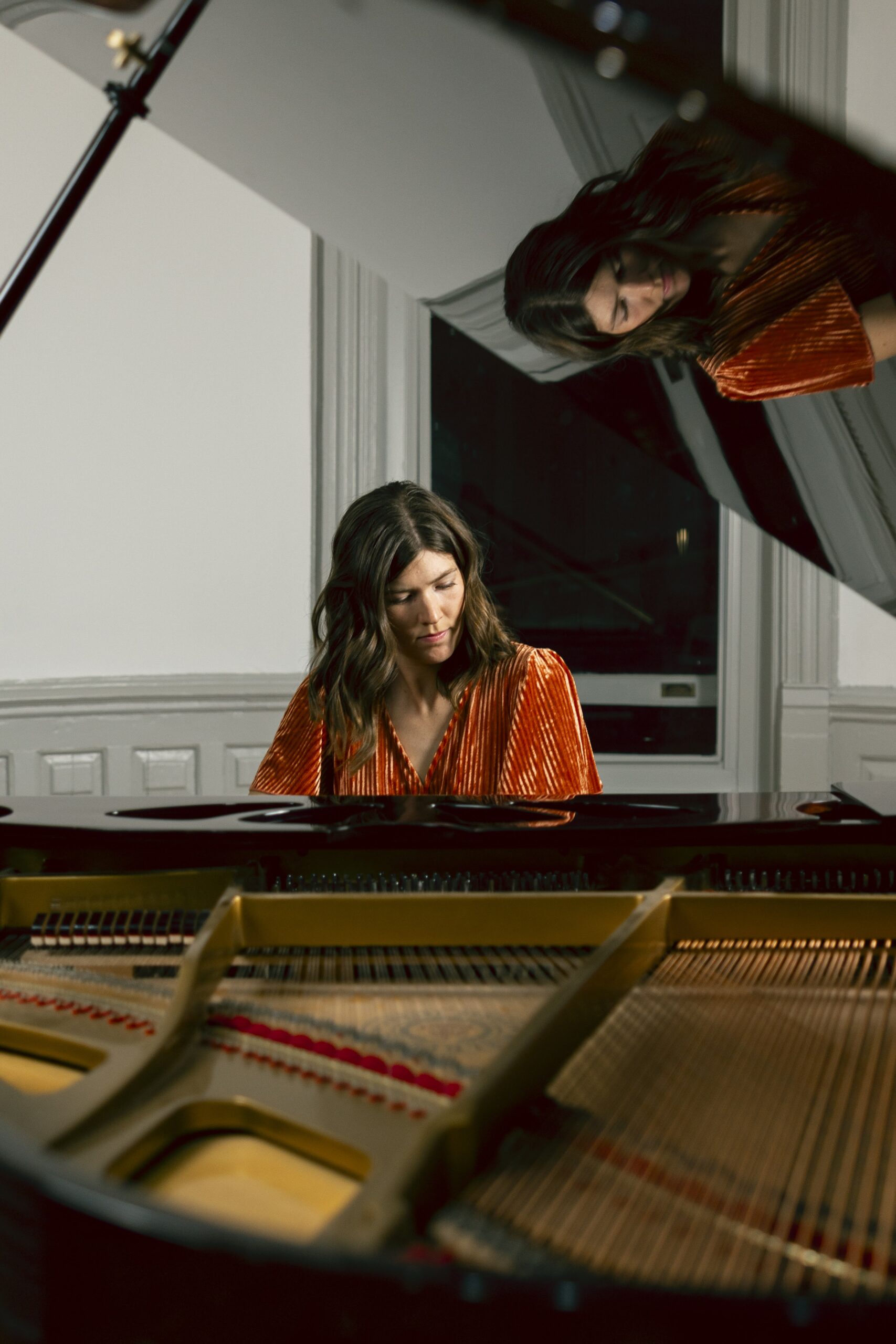 A pianist plays the piano